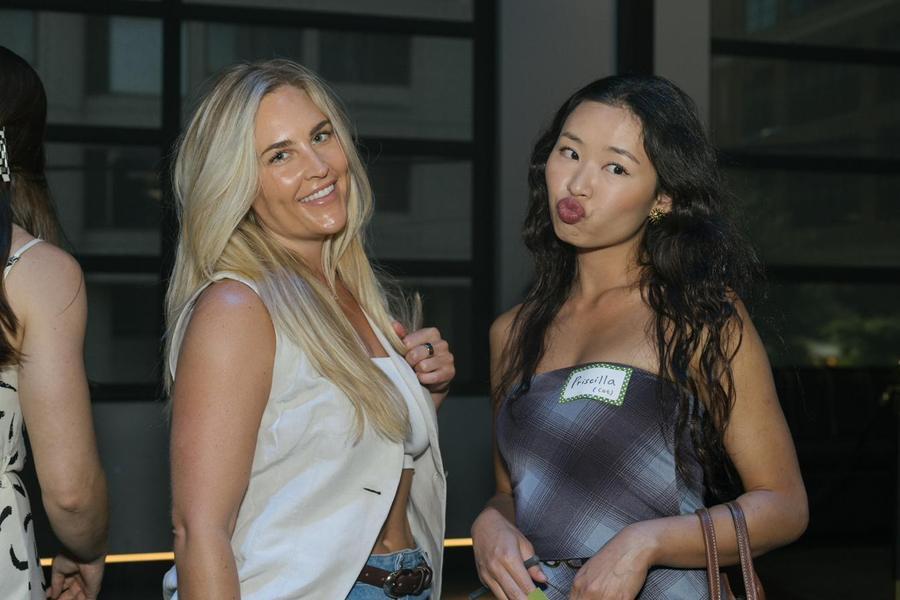 Two attendees having fun together